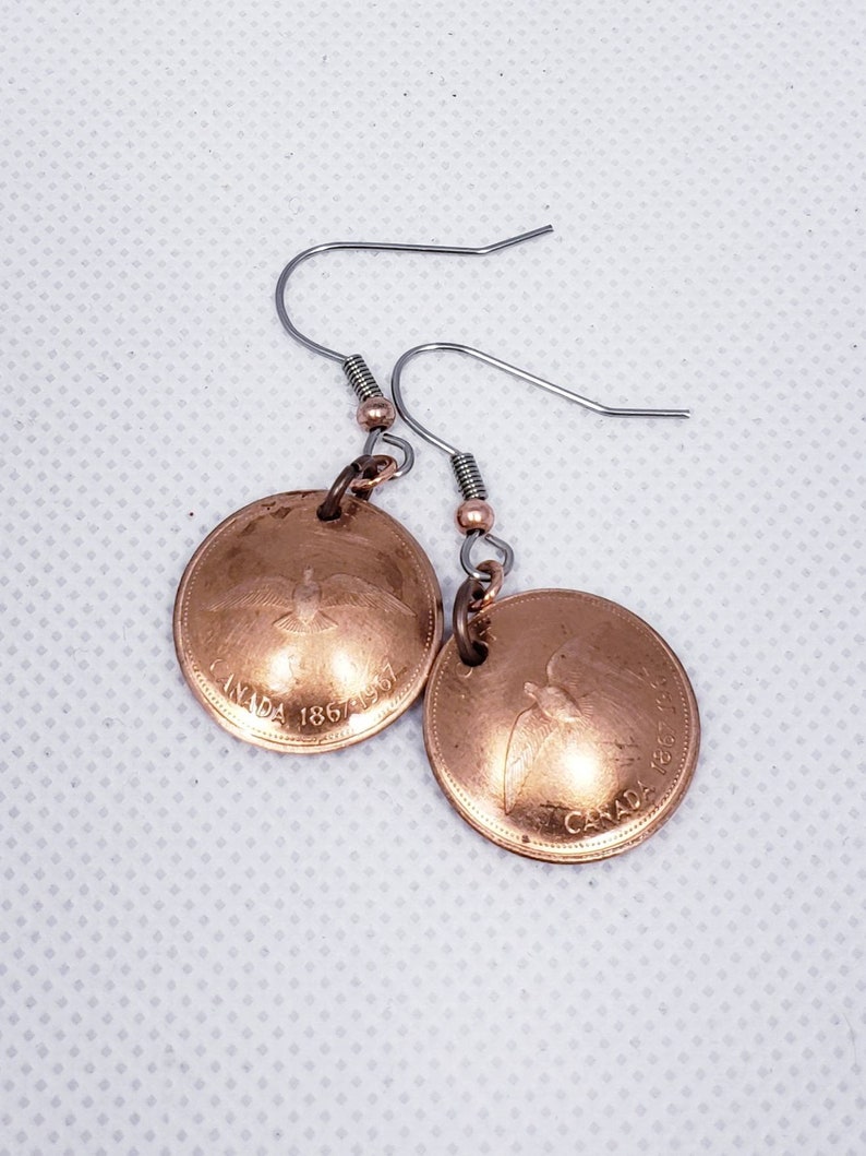 Coin earrings hand made with 1967 Canadian Centennial pennies.