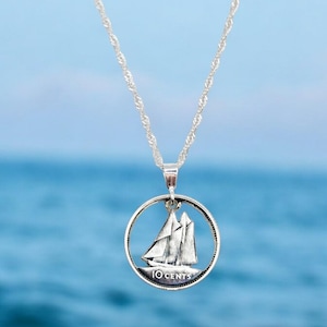 Hand carved coin pendant. Canadian silver dime necklace.