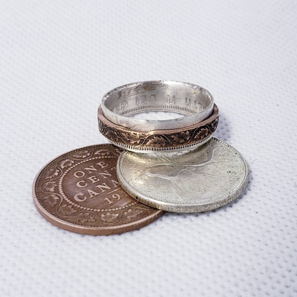 Spinner coin ring. Handmade from old silver Canadian quarters and 100+ year old Canadian pennies.