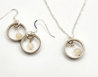 Earrings and necklace set. Handmade from silver dimes with fire opals.