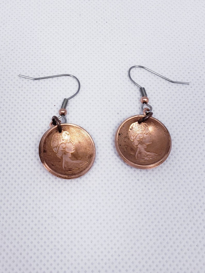 Coin earrings hand made with 1967 Canadian Centennial pennies.