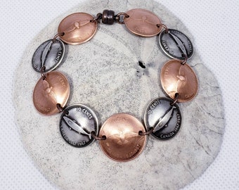Canadian penny and dime bracelet hand made from 1967 centennial coins.