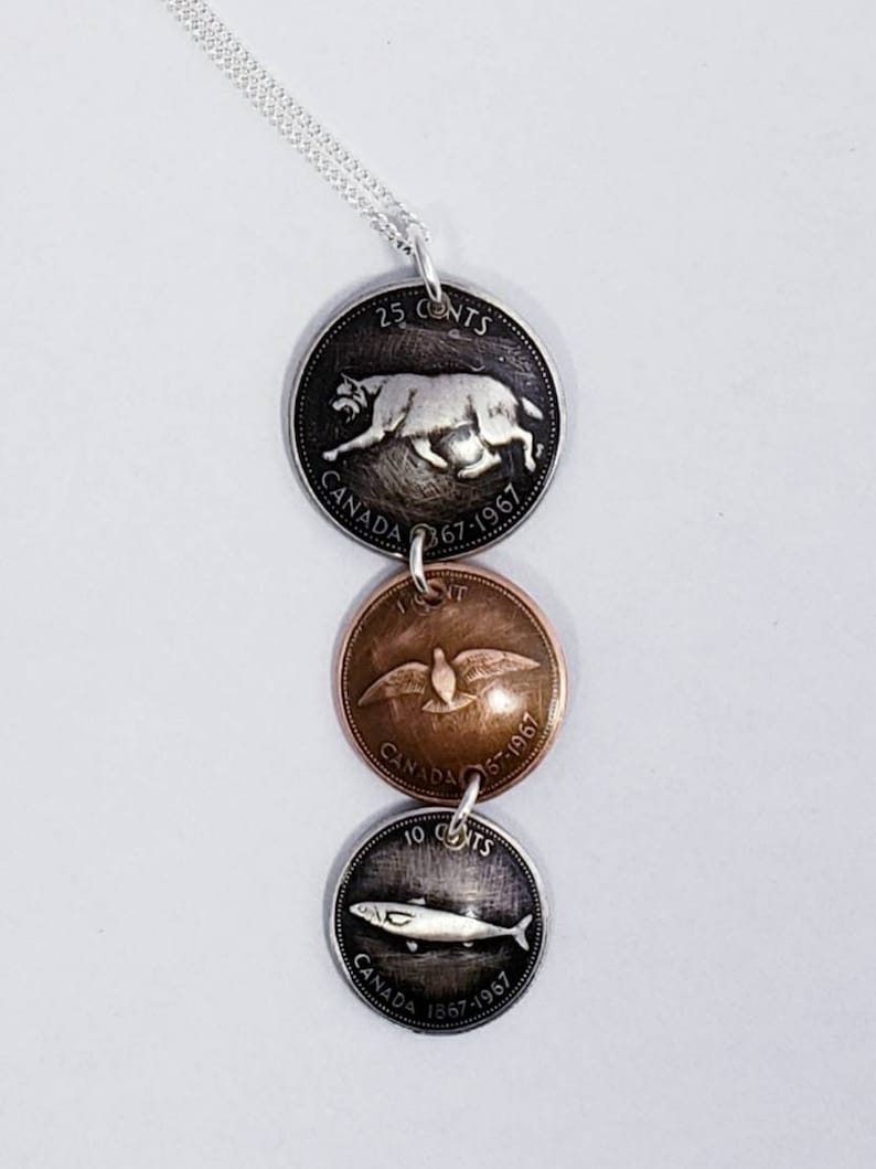 Coin necklace Handmade coin pendant using 1967 Canadian centennial coins.