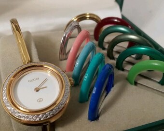 gucci bangle bezel watch