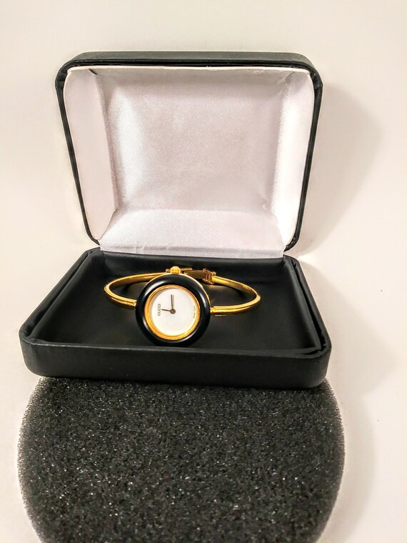 gucci bangle watch with interchangeable rings