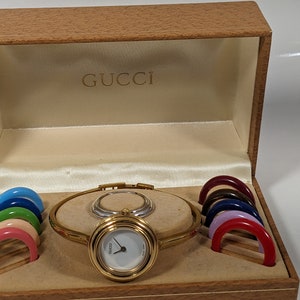 Vintage Gucci multi bezel Swiss watch with certificate of authenticity