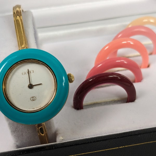 Reloj suizo Gucci vintage con múltiples biseles y certificado. de autenticidad