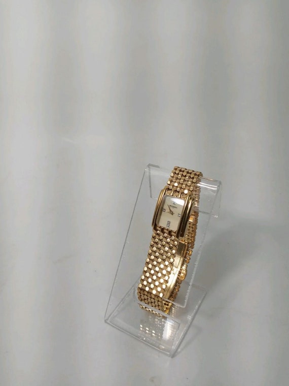 Vintage Wittnauer gold tone 4 diamond face Swiss m