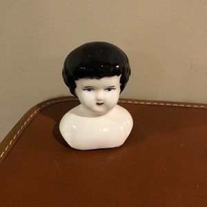 Vintage medium porcelain doll head