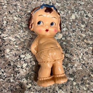 Vintage adorable celluloid doll