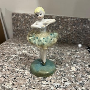 Vintage spinning porcelain ballerina figurine