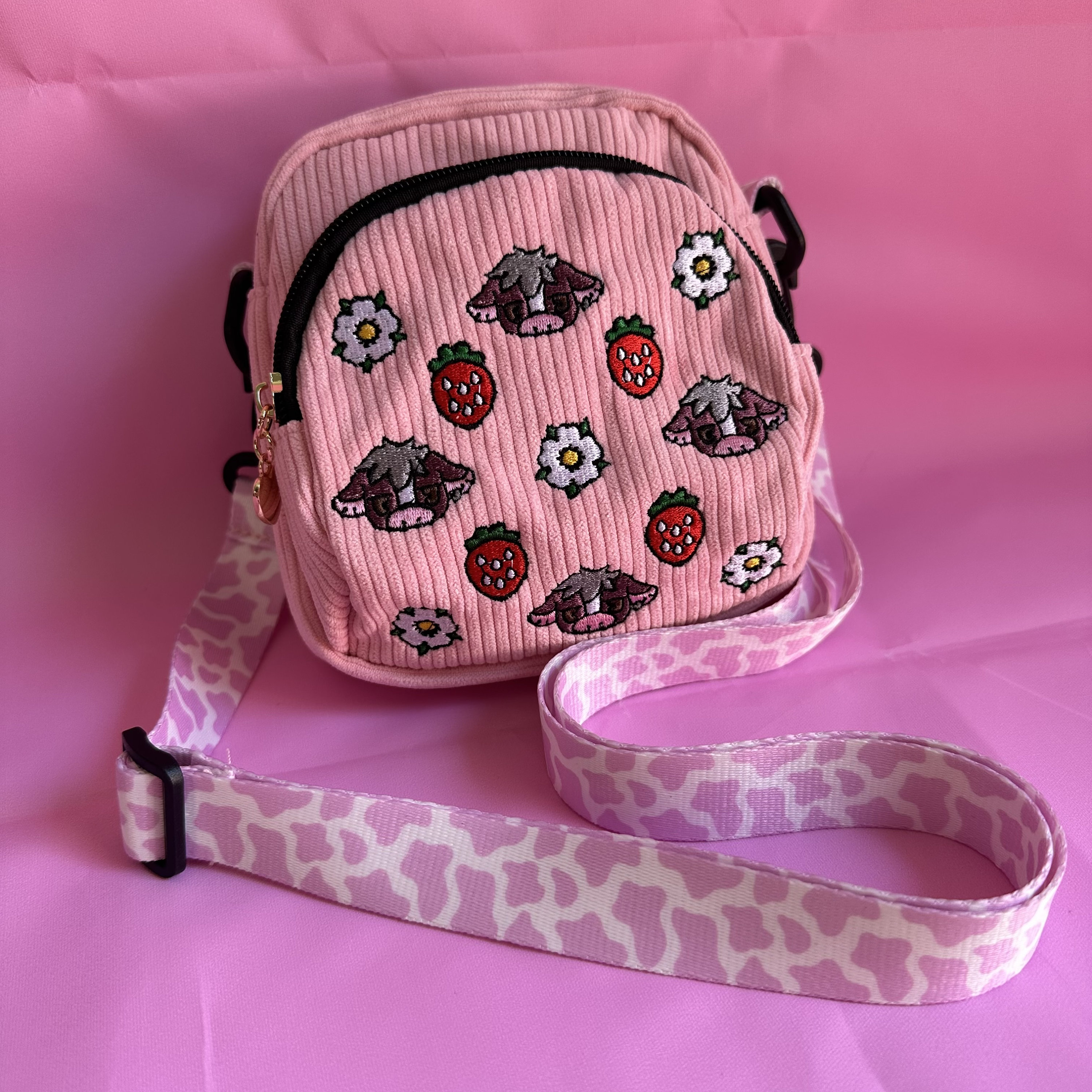 Pink cow print purse hotsell