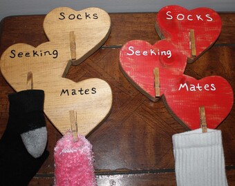 Wood "Socks seeking mates" sign for the laundry room.  This cute heart trio sock looking for mates signs is sure add charm to laundry room.