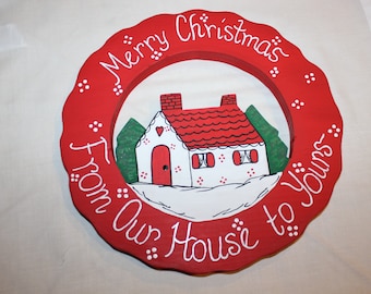 Hand painted wooden Christmas wreath. " Merry Christmas from our house to yours" very festive and bright.