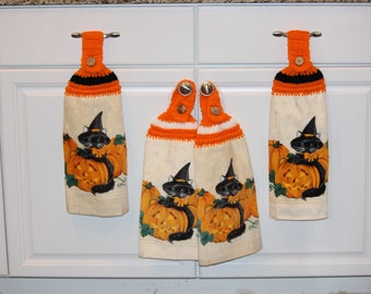 Crochet top hanging double layer cotton towels Halloween cat and pumpkin design. Great to use in the kitchen, bathroom, mudroom, RV or gift.