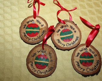 Set of 4 hand painted oak wood slice Christmas ornaments.  Made from reclaimed oak trees taken down by Hurricane Matthew. Great for gifts!