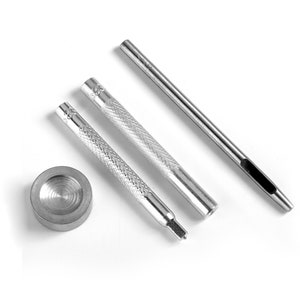 May include: A set of four silver metal tools for setting eyelets. The set includes a punch, a hammer, a setting tool, and a metal eyelet.