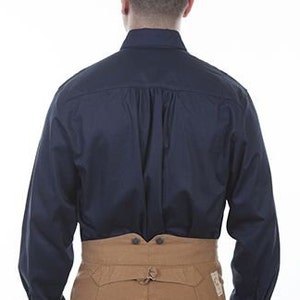 May include: A navy blue long-sleeved shirt with a button-down collar.