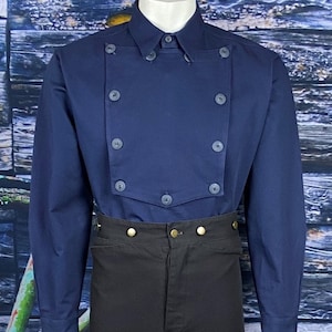 May include: A navy blue long-sleeved shirt with a double-breasted front and gold buttons. The shirt has a pointed collar and a traditional button-up closure.
