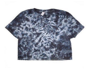 May include: A cropped tie-dye t-shirt in a blue and white swirl pattern.