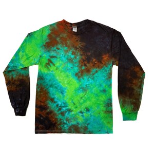 May include: A long-sleeved shirt with a tie-dye pattern in shades of green, brown, and blue.