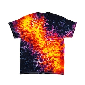 May include: A short-sleeved t-shirt with a vibrant tie-dye pattern. The shirt features a blend of colors, including yellow, orange, purple, and navy blue. The tie-dye design creates a swirling, abstract effect across the fabric.