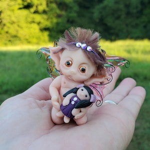 Baby Fairy Miniature, Fantasy Baby, Holding a Doll