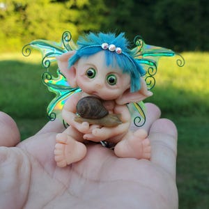 Baby Fairy Miniature, Fantasy Baby, Holding a Snail