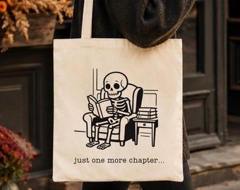 Just One More Chapter Tote Bag | Skeleton Reading A Book Canvas Tote | Bookish Tote Bag | Halloween Gift for Readers | Book Lover Tote