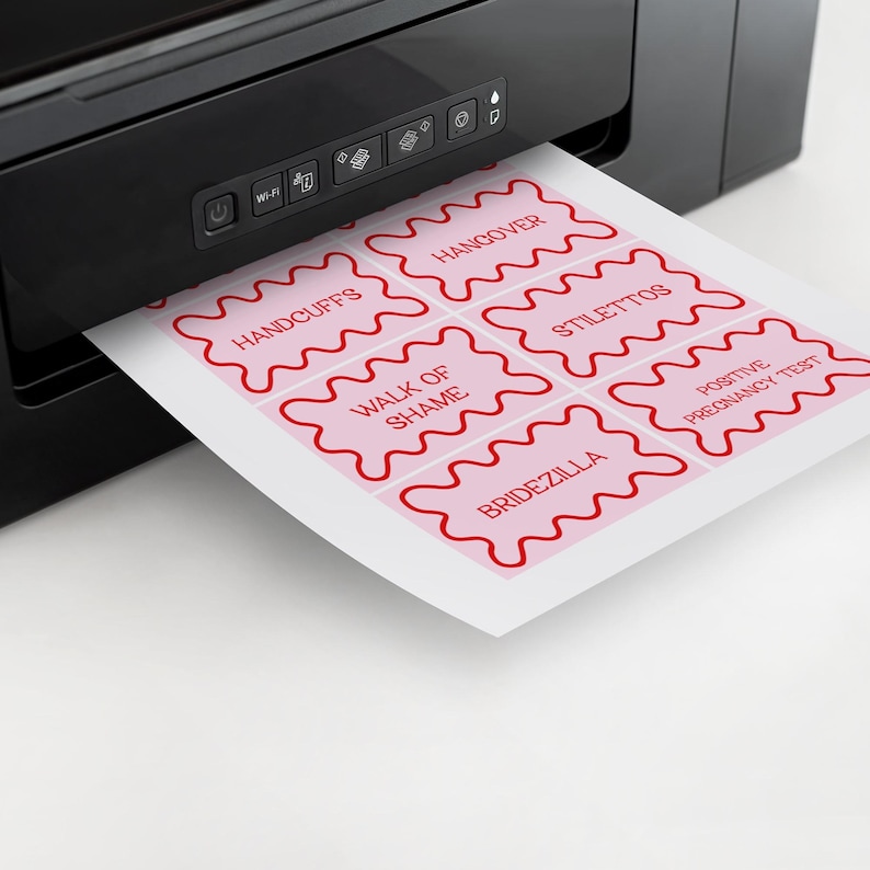 a close up of a printer with a piece of paper in front of it