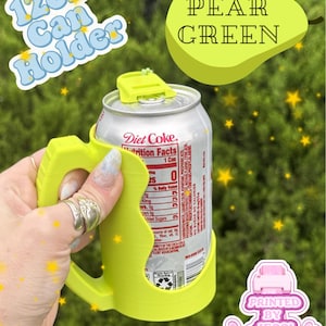 May include: A lime green 12oz can holder with a handle, holding a silver Diet Coke can. The text 12oz Can Holder and Pear Green are visible. A small graphic with the text Printed By Jessi is in the corner. The holder features a top tab.