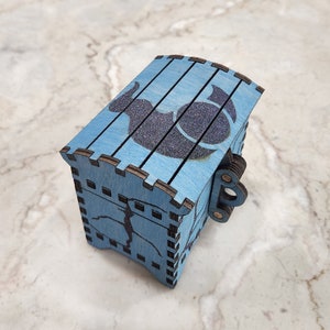 Tzeentch themed dice treasure chest for tabletop gaming and other dice games.