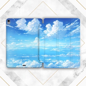 May include: A tablet case featuring a vibrant blue sky design with fluffy white clouds. The case is open, showcasing the interior and exterior with the same cloudscape pattern. The design evokes a sense of openness and tranquility.