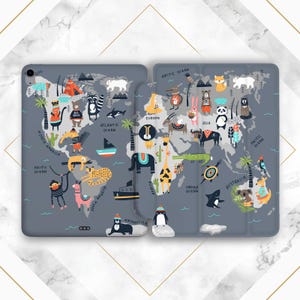 May include: Grey iPad case with a world map design, illustrated with animals and continents. The case features the text "NORTH AMERICA", "PACIFIC OCEAN", "ATLANTIC OCEAN", "EUROPE", "ASIA", "SOUTH AMERICA", "INDIAN OCEAN", "AUSTRALIA", "ARCTIC OCEAN", and "ANTARCTICA".