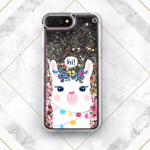 May include: A clear phone case with a black glitter background and a white llama with a flower crown and the word "hi!" in a speech bubble. The llama is wearing a string of colorful lights.