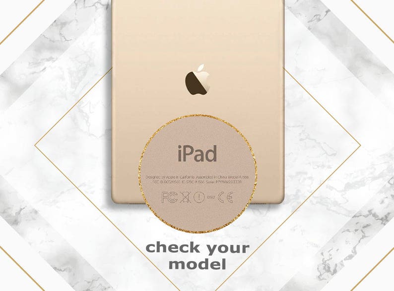 May include: A gold iPad with a white Apple logo and the text "iPad" on the back. The text "Designed in California Assembled in China Model A1474 FCC ID: QN8-A1474 IC: 579C-A1474" is also visible on the back of the device.