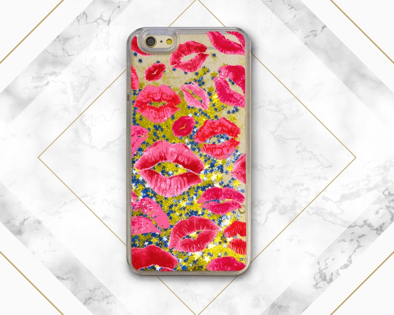 May include: A clear phone case with a gold glitter background and red lips printed on it.