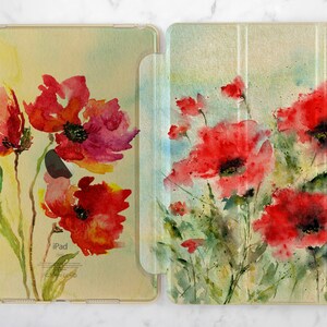 May include: A watercolor painting of red poppies on a light green background. The painting is on a tablet case with a clear plastic cover.