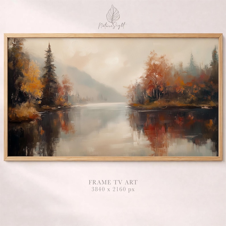 May include: A framed landscape painting depicts a serene lake scene with autumn foliage. The artwork features a wooden frame and a color palette of muted greens, oranges, and browns. The text "Nature Sight" and "FRAME TV ART 3840 x 2160 px" are visible.