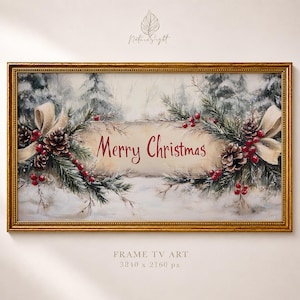 Könnte beinhalten: Ein gerahmtes Kunstwerk zum Thema Weihnachten. Das Bild zeigt eine verschneite Waldszene mit Kiefernzweigen, Tannenzapfen und roten Beeren. Die Worte "Merry Christmas" sind rot geschrieben. Der Rahmen ist goldfarben.