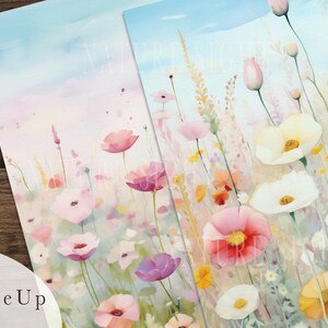 May include: A watercolor painting of a field of wildflowers in shades of pink, white, and yellow. The flowers are arranged in a loose, natural pattern, and the background is a soft blue sky.