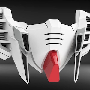 May include: A white and red futuristic mask with a sharp, angular design. The mask has a red pointed nose and white wings with black details.