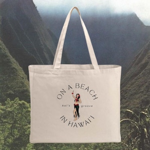 on a beach in hawai’i tote bag