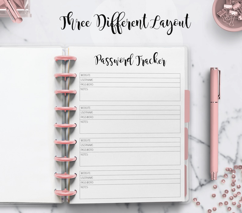 May include: A white planner with a pink binder and the text "Three Different Layout Password Tracker" on the cover. The planner has four sections for website, username, password, and notes.