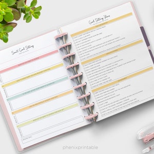 May include: A printable planner page with a pink, yellow, and green color scheme. The page is titled "Smart Goal Setting" and includes sections for goal, specific, measurable, achievable, relevant, and time-bound. The page also includes a section titled "Goal Setting Ideas" with suggestions for personal growth and development.