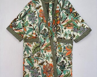 Giacca kimono lunga trapuntata in cotone con tasca per cintura, ideale per feste.