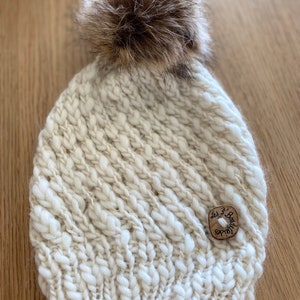 Knitted hat in 100% natural wool, handmade seasonal accessory