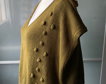 Sleeveless sweater knitted in 100% natural Pima cotton fiber, handmade