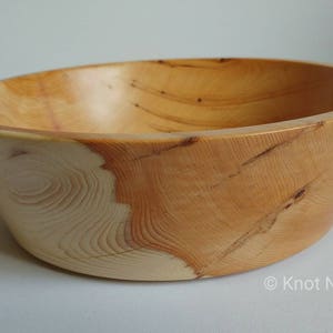Hand-turned Yew wooden bowl