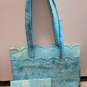 Scalloped edge bag with matching wallet
